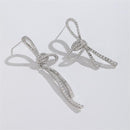 Stylishwe  非対称 リボンデザイン ホワイトゴールド  ピアス