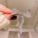 Stylishwe   エレガント リボンデザイン ブローチ 合わせやすい